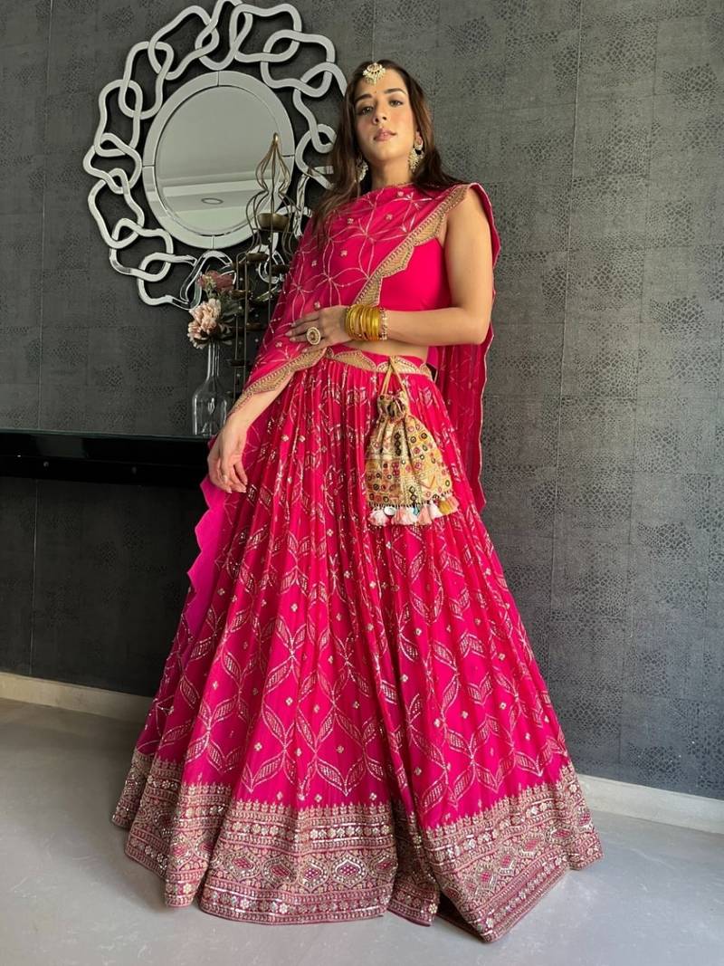 Dark Pink Zari and Sequins Embroidered georgette semi stitched lehenga choli