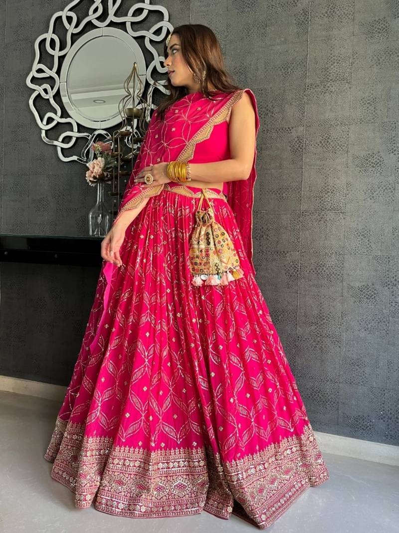 Dark Pink Zari and Sequins Embroidered georgette semi stitched lehenga choli