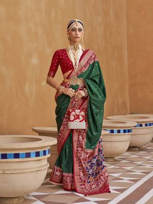 Elora Woven Designed Patola Silk Blend Saree (Green) 1