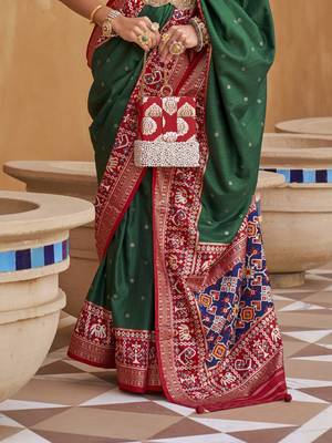 Elora Woven Designed Patola Silk Blend Saree (Green) 4