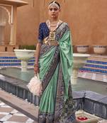 Elora Woven Designed Patola Silk Blend Saree (Green)