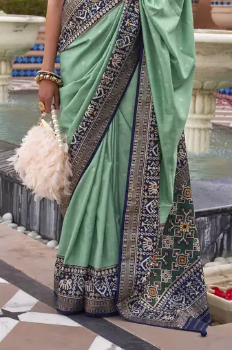 Elora Woven Designed Patola Silk Blend Saree (Green)