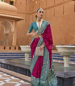 Elora Woven Designed Patola Silk Blend Saree (Pink)