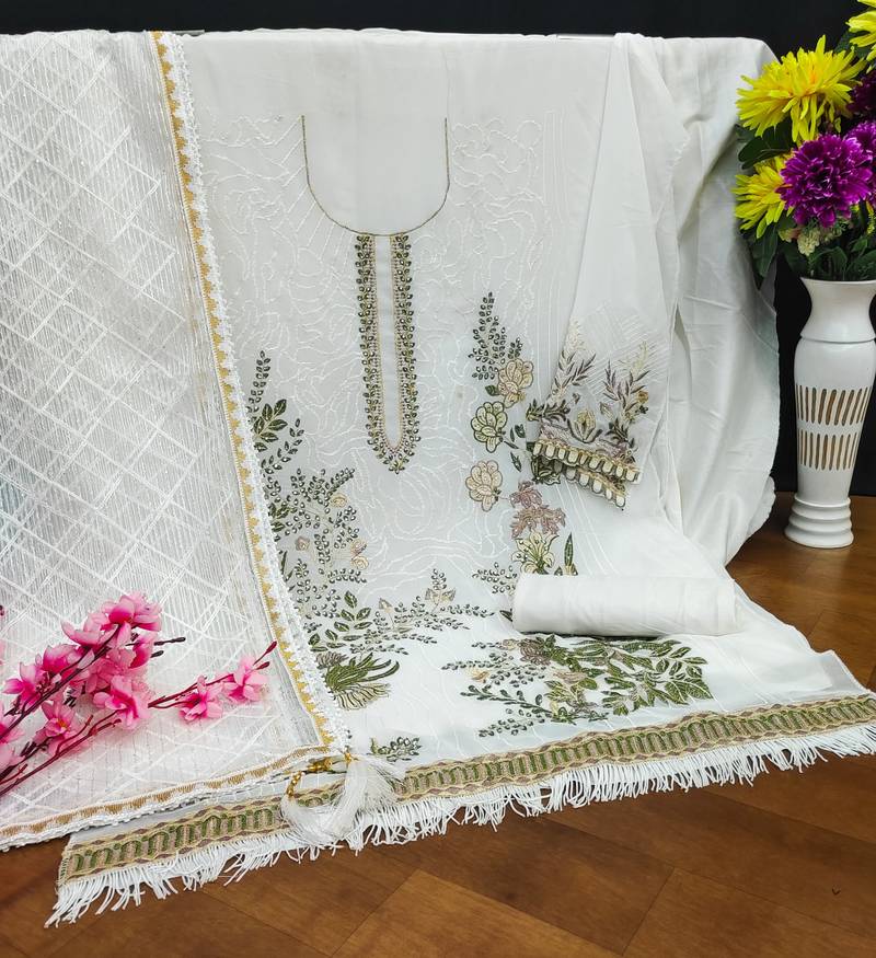 White pakistani suit with sequence embroidery work and diamond work