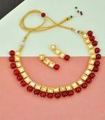 Women gold-plated & red kundan stone-studded jewellery set