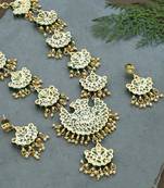 gold-plated green & white kundan studded jewellery set