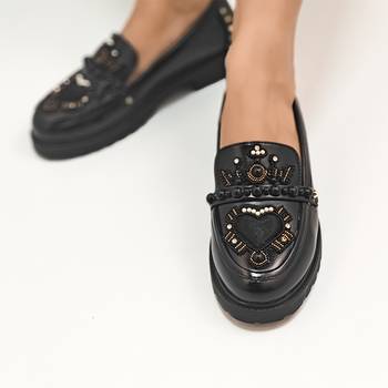 Black embroidery dolce vita loafer heels 1