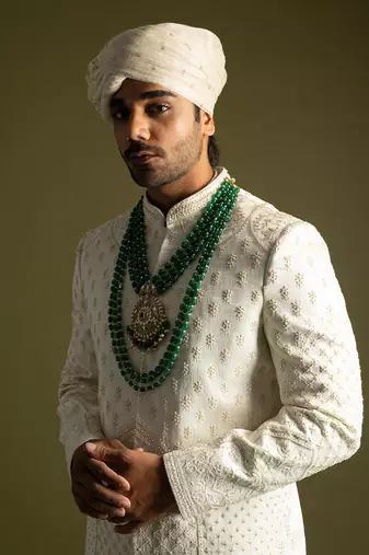 Ivory thread work sherwani set