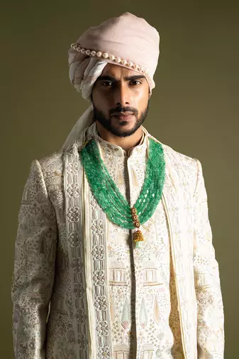 Cream raw silk embroidered sherwani set