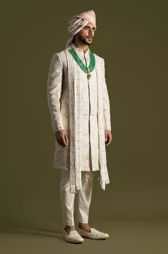 Cream raw silk embroidered sherwani set