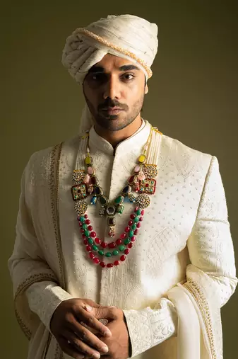 Ivory tonal thread work sherwani set