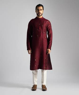 Deep red kurta with a cream pant 1