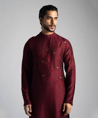 Deep red kurta with a cream pant 2