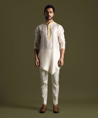 Cream asymmetric cut silk kurta with cream pants 1