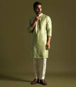 Pistachio green silk kurta with cream pants