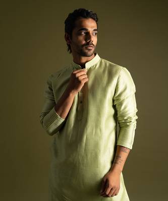 Pistachio green silk kurta with cream pants 2