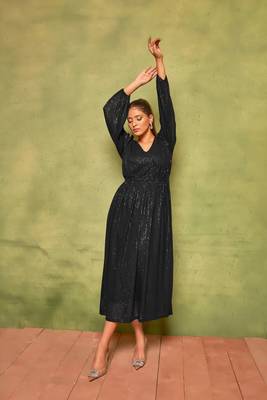 Rich black sequin pleated dress for effortless nights. 3