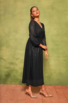 Rich black sequin pleated dress for effortless nights. 4