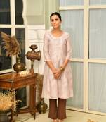 A line printed kurta set in kota dori with pleating details paired with cotton pants