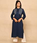 Straight kurta with pintucks and embroidery details paired with straight rayon pant.