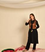 Black straight kurta in cotton with pintucks paired up with ethnic embroidered mirrorwork jacket with and black pant