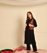 Black straight kurta in cotton with pintucks paired up with ethnic embroidered jacket and plain black rayon pant