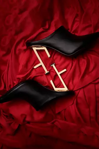 Pointed mules with metal heels