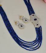 Sapphire blue long ranihar jewellery set with ad brooch