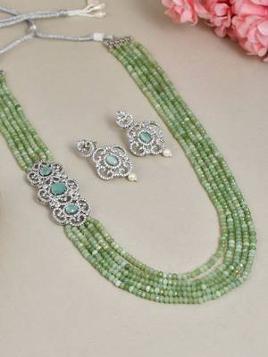 Peridot layered necklace with ad brooch and earrings 1