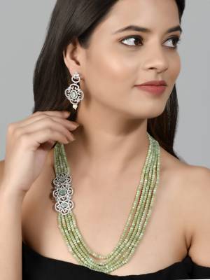 Peridot layered necklace with ad brooch and earrings 2