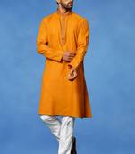 Orange embroidered art silk kurta churidar traditional look