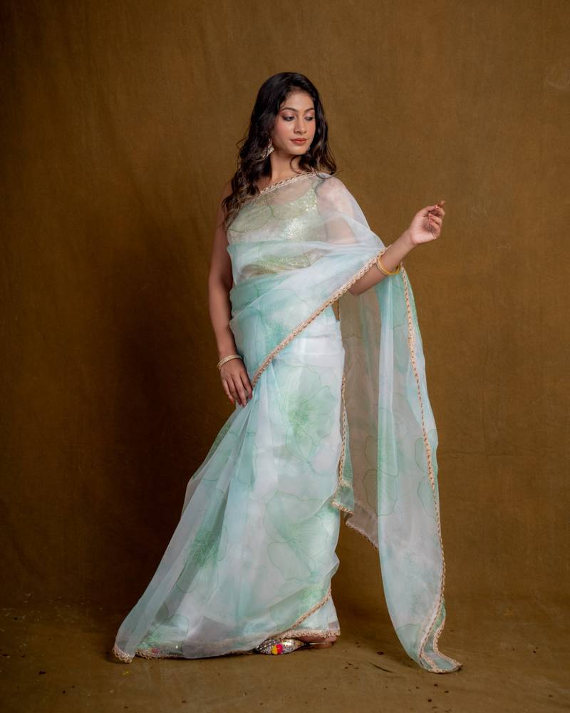 Sea green floral play organza saree with blouse