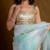 Sea green floral play organza saree with blouse