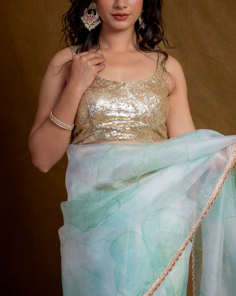 Sea green floral play organza saree with blouse