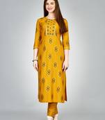 Women embroidered rayon yellow kurta pant set