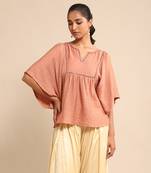 Pink solid kaftan kurti By ritu kumar