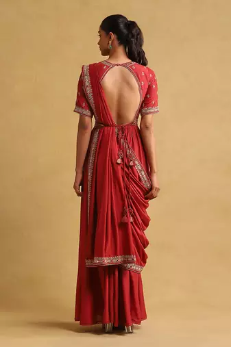 Rust embroidered draped saree by RITU KUMAR