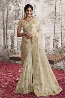 Off white silk heavy thread embroidred with sequince work saree with blouse 1