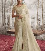 Off white silk heavy thread embroidred with sequince work saree with blouse