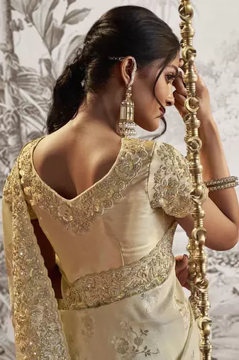 Off white silk heavy thread embroidred with sequince work saree with blouse