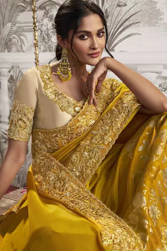 Mustard silk heavy thread embroidred with sequince work saree with blouse
