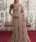 Light mauve silk heavy thread embroidred with sequince work saree with blouse