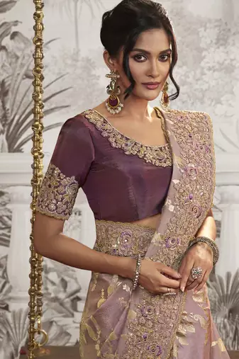 Light mauve silk heavy thread embroidred with sequince work saree with blouse