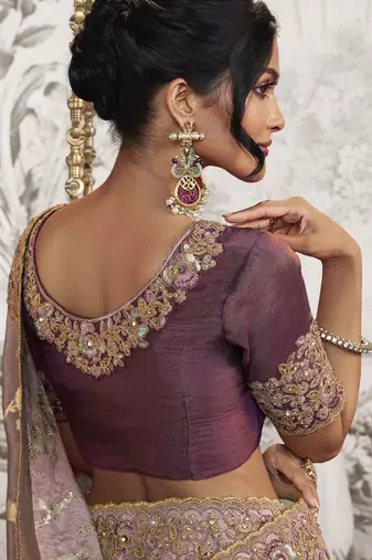 Light mauve silk heavy thread embroidred with sequince work saree with blouse