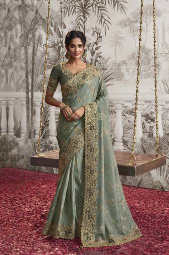 Sea green silk heavy thread embroidred with sequince work saree with blouse