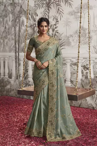 Sea green silk heavy thread embroidred with sequince work saree with blouse