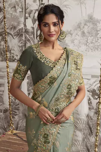 Sea green silk heavy thread embroidred with sequince work saree with blouse