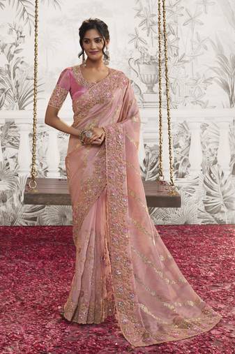 Light peach pink silk heavy thread embroidred with sequince work saree with blouse