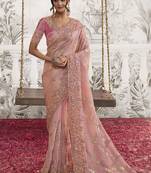 Light peach pink silk heavy thread embroidred with sequince work saree with blouse