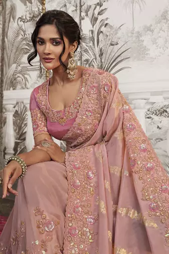 Light peach pink silk heavy thread embroidred with sequince work saree with blouse
